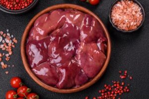 fresh-raw-chicken-or-beef-liver-with-salt-spices-and-herbs-photo